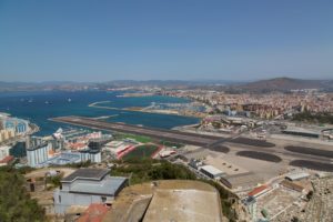 The view from the rock across the airport into Spain. Note the road in is closed for a plane.